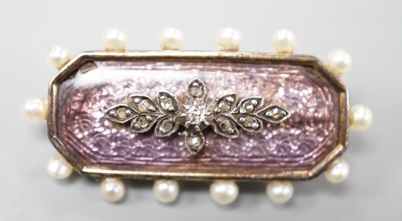 An Edwardian yellow metal, seed pearl, diamond and enamel set brooch, 31m, gross weight 5.4 grams.